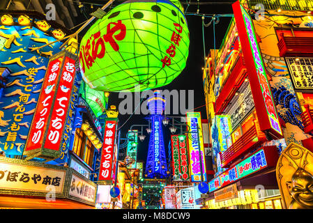 OSAKA - NOVEMBER 24: Tsutenkaku Tower in Shinsekai (new world) district at night on November 24, 2014, in Osaka. It is a tower and well-known landmark Stock Photo