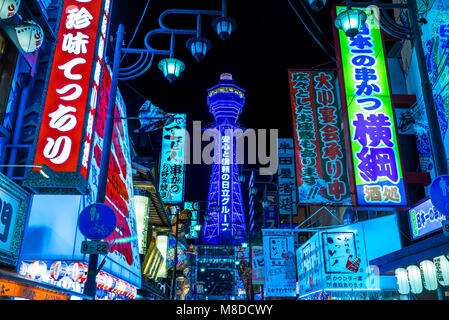 OSAKA - NOVEMBER 24: Tsutenkaku Tower in Shinsekai (new world) district at night on November 24, 2014, in Osaka. It is a tower and well-known landmark Stock Photo