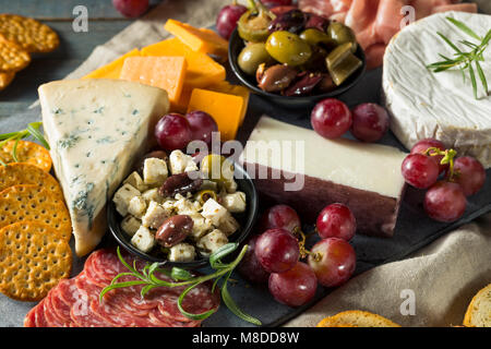 Gourmet Fancy Charcuterie Board with Meat Cheese and Grapes Stock Photo