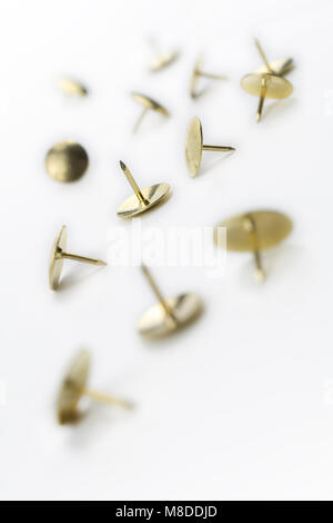 A Small Collection of Thumbtacks In A White Box - Crooked Angle #1 Stock Photo