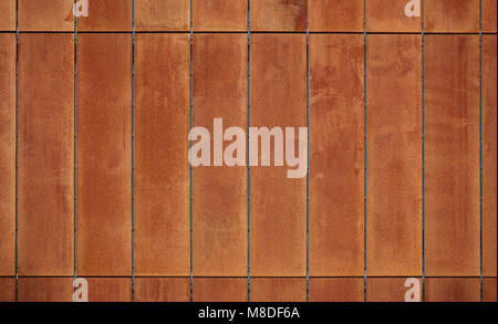 Rusty steel panels on a modern building. Stock Photo