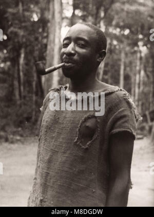 1940s East Africa Uganda - Budongo forest, felling and sawing mahogany trees - a woodsman with his pipe