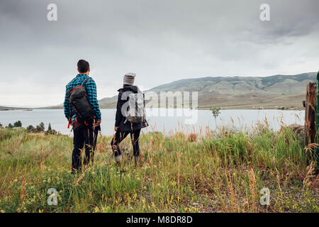 Couple near Dillon Reservoir, looking at view, Silverthorne, Colorado, USA Stock Photo