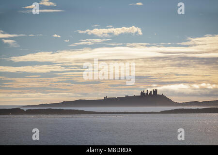 Dunstanburgh Castle from the Coastal Path, Northumberland Stock Photo