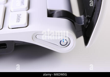 Button of turning on of the laptop closeup Stock Photo