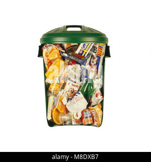Dustbin full of household rubbish - cutaway Stock Photo
