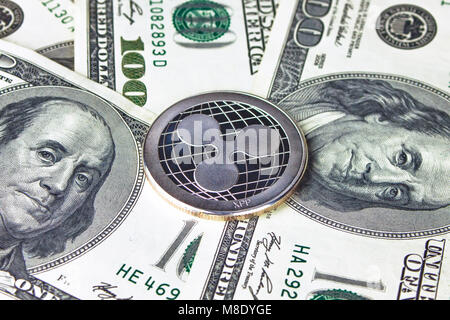 Coin ripple silver xrp close up, the coin on American dollars money Stock Photo