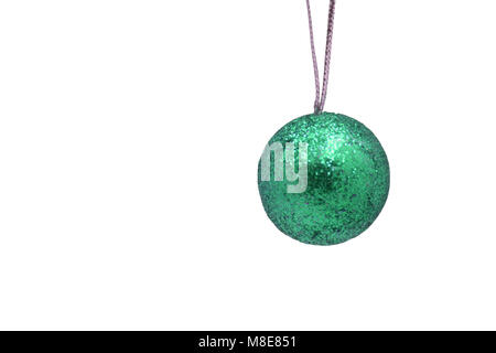Blue Christmas ball hanging on ribbon Isolated on white background . Stock Photo