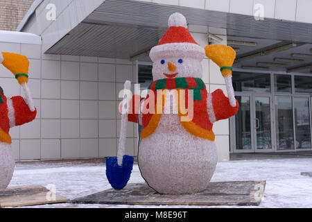Grandpa snowman in hat and broom , Stock Photo