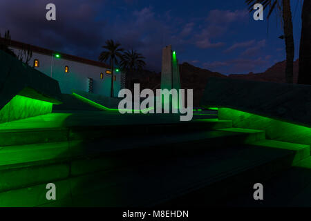 Plaza de Espana, Adeje, Tenerife, 16 March 2018. The plaza in the old town is floodlit in green to celebrate Saint Patricks day and to join the world wide wave of greening of buildings and monuments. Stock Photo