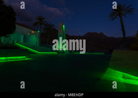 Plaza de Espana, Adeje, Tenerife, 16 March 2018. The plaza in the old town is floodlit in green to celebrate Saint Patricks day and to join the world wide wave of greening of buildings and monuments. Stock Photo