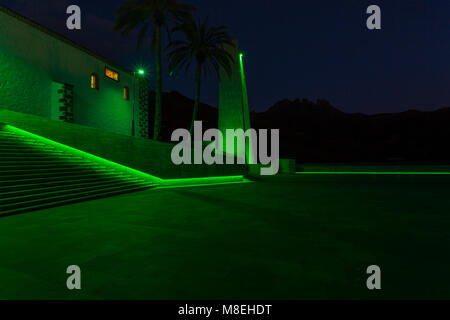 Plaza de Espana, Adeje, Tenerife, 16 March 2018. The plaza in the old town is floodlit in green to celebrate Saint Patricks day and to join the world wide wave of greening of buildings and monuments. Stock Photo