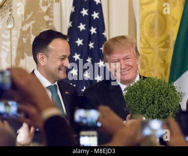 WASHINGTON, DC - WEEK OF MARCH 12- 16: President Donald J. Trump receives the presentation of the Shamrock Bowl from Irish Prime Minister Leo Varadkar in the East Room at the White House, Thursday, March 15, 2018, in Washington, D.C    People:  President Donald Trump Stock Photo
