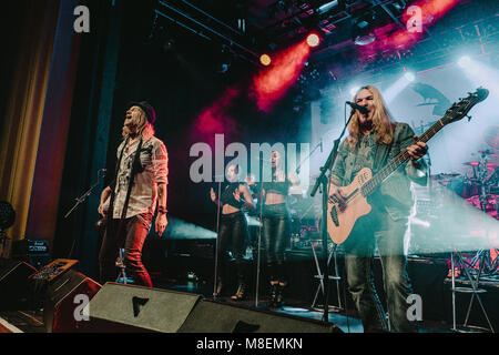 Switzerland, Bern - March 16, 2018. The Swiss hard rock band Gotthard performs a live concert at Bierhübeli in Bern. Here singer Nic Maeder is seen live on stage with bass player Marc Lynn. (Photo credit: Gonzales Photo - Tilman Jentzsch). Stock Photo