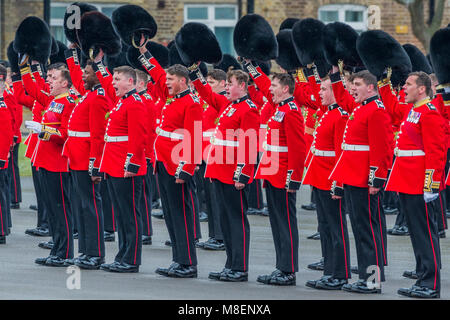 London, UK, 17 Mar 2018. Three cheers for the royal couple - The Duke of Cambridge, Colonel of the Irish Guards, accompanied by The Duchess of Cambridge, visited the 1st Battalion Irish Guards at their St. Patrick's Day Parade. 350 soldiers marched onto the Parade Square at Cavalry Barracks led by their mascot, the Irish Wolfhound Domhnall. Stock Photo