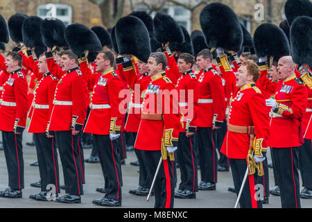 London, UK, 17 Mar 2018. Three cheers for the royal couple - The Duke of Cambridge, Colonel of the Irish Guards, accompanied by The Duchess of Cambridge, visited the 1st Battalion Irish Guards at their St. Patrick's Day Parade. 350 soldiers marched onto the Parade Square at Cavalry Barracks led by their mascot, the Irish Wolfhound Domhnall. Stock Photo