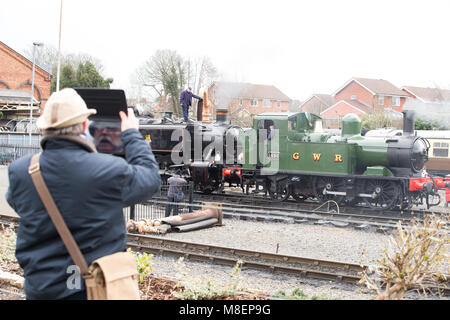 Kidderminster, UK. 17th March, 2018. Severn Valley Rail enthusiasts enjoy taking pictures and travelling on the heritage railway line that runs from Kidderminster to Bridgnorth. Wintry conditions of low temperatures and snow have not put people off indulging in their passion for the nostalgia of the UK steam railway.  Credit: Lee Hudson/Alamy Live News Stock Photo