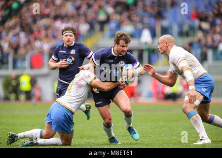 Rome, Italy. 17th February 2018. Scotland's centre Peter Horne tries to resist to Italy defense in NatWest 6Nations Championship 2018 Massimiliano Carnabuci/Alamy Live News Stock Photo