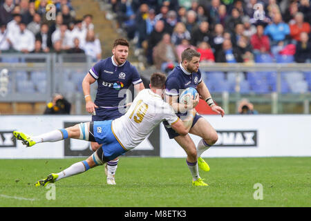 Rome, Italy. 17th February 2018. Scotland's wing Tommy Seymour tries to break a tackle in the match against Italy in NatWest 6Nations Championship 2018 Massimiliano Carnabuci/Alamy Live News Stock Photo