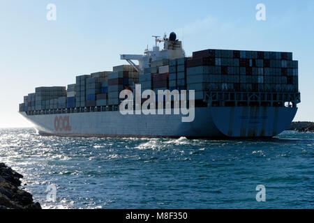 Container ship OOCL OAKLAND (Panama), leaving  Fremantla harbour, Fremantle, Western Australia Stock Photo