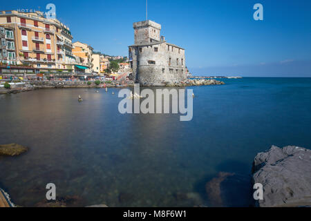 RAPALLO, ITALY, JULY, 12, 2017 - The ancient castle on the sea, Rapallo, Genoa (Genova), Italy. Long exposure photo. Stock Photo