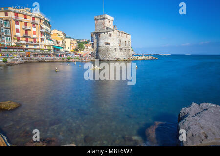 RAPALLO, ITALY, JULY, 12, 2017 - The ancient castle on the sea, Rapallo, Genoa (Genova), Italy. Long exposure photo. Stock Photo