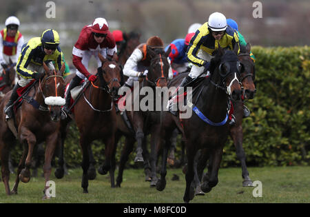 Runners and riders in action in the Glenfarclas Chase during Ladies Day of the 2018 Cheltenham Festival at Cheltenham Racecourse. Stock Photo