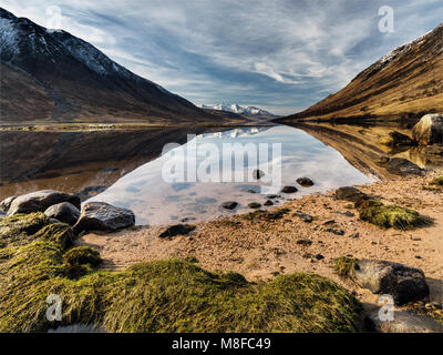 The waters of Loch Etive reflecting the surrounding mountains, Argyll and Bute, Scotland, UK,  Europe Stock Photo