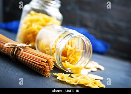 different kind of pasta, raw pasta on a table Stock Photo
