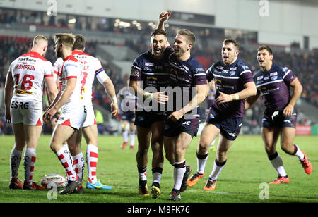 Leeds Rhinos Matt Parcell (centre) celebrates his try against St Helens, during the Betfred Super League match at The Totally Wicked Stadium, St Helens. Stock Photo