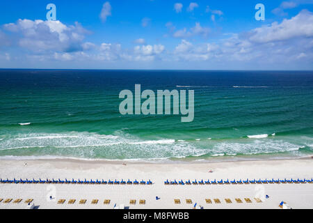 Ariel View of Panama Beach with people relaxing below on blue beach chairs Stock Photo