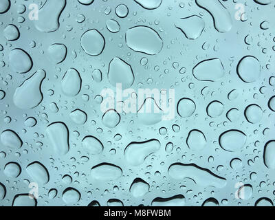 Raindrops on a window during a storm Stock Photo