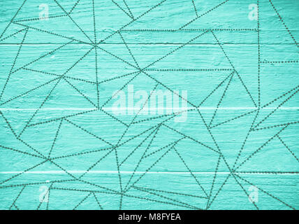 Hand painted dots and lines on blue wood background Stock Photo