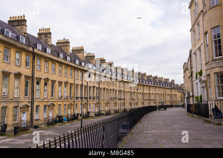 Bath, UK - April 2017: Street view of Georgian residential tenement building area made from the local, golden-coloured, Bath Stone Stock Photo