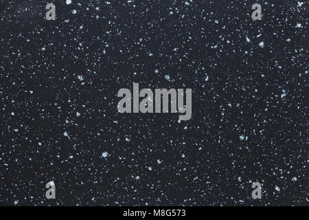Shiny points on a dark backgrounds that look like starss in the night sky Stock Photo