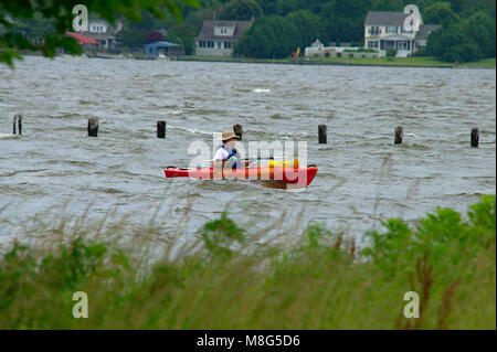 Man kayaking during choppy waters in  the Potomac River Stock Photo