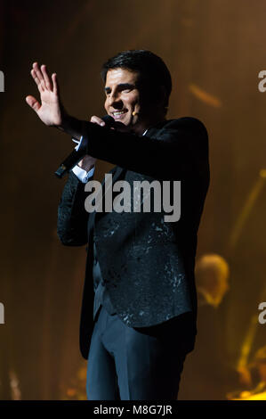 Naples, Italy. 16th Mar, 2018. Sal Da Vinci on the stage of the Augusteo Theater in Naples with 50 musicians, directed by maestro Adriano Pennino with the theatrical show 'Sinfonie in Sal Maggiore' Credit: Sonia Brandolone/Pacific Press/Alamy Live News Stock Photo