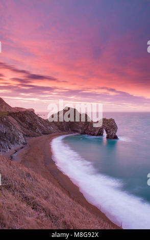 Durdle Door sunrise on the Jurassic coast of Dorset Stock Photo