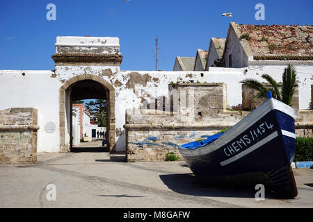 ESSAOUIRA, MOROCCO - CIRCA MARCH 2018 Old fort with gate and boat Stock Photo