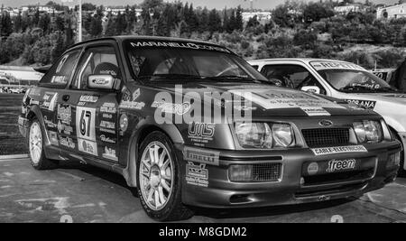 SANMARINO, SANMARINO - OTT 21, 2017 : FORD ESCORT COSWORTH 1993 in old racing car rally THE LEGEND 2017 the famous SAN MARINO historical race Stock Photo