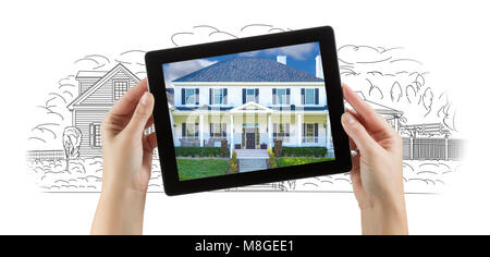 Female Hands Holding Computer Tablet with House Photo on Screen & Drawing Behind. Stock Photo