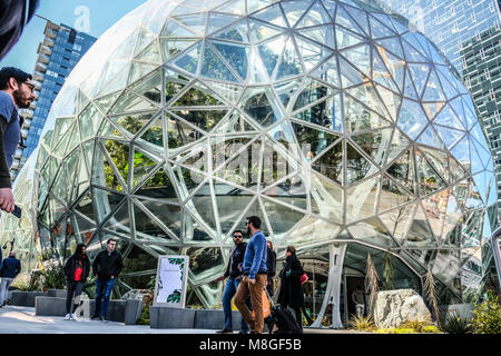 People walking by the glass dome Spheres at Amazon headquarter in downtown Seattle Stock Photo
