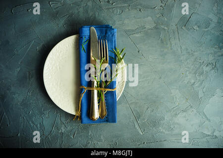 Spring table setting with bright yellow mimosa flowers Stock Photo