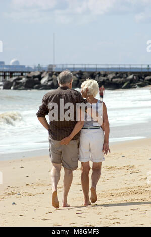 Older Couple on Beach Stock Photo