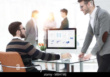 two businessmen analyzing stats financial data Stock Photo