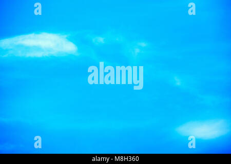 High white wispy cirrus clouds with cirro-stratus in the blue Australian sky sometimes called mare's tails indicate fine weather now but Stock Photo