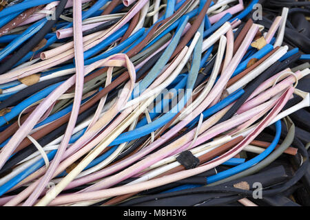 Colored wires cropping the background of them . Stock Photo
