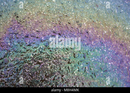 Oil Slick close up - abstract background shimmers on Stock Photo