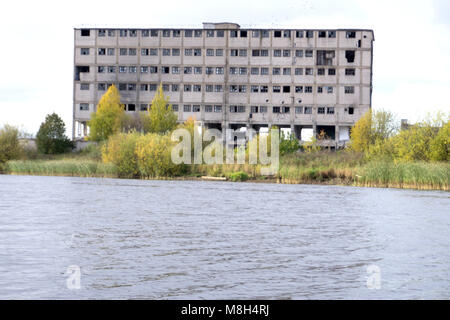 ruins of a very heavily polluted industrial factory, place was known as one of the most polluted towns . Stock Photo