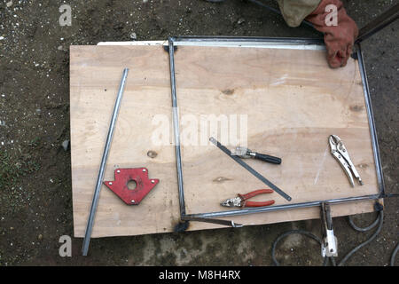 gardening tools on dark wooden background with space for text top view Stock Photo